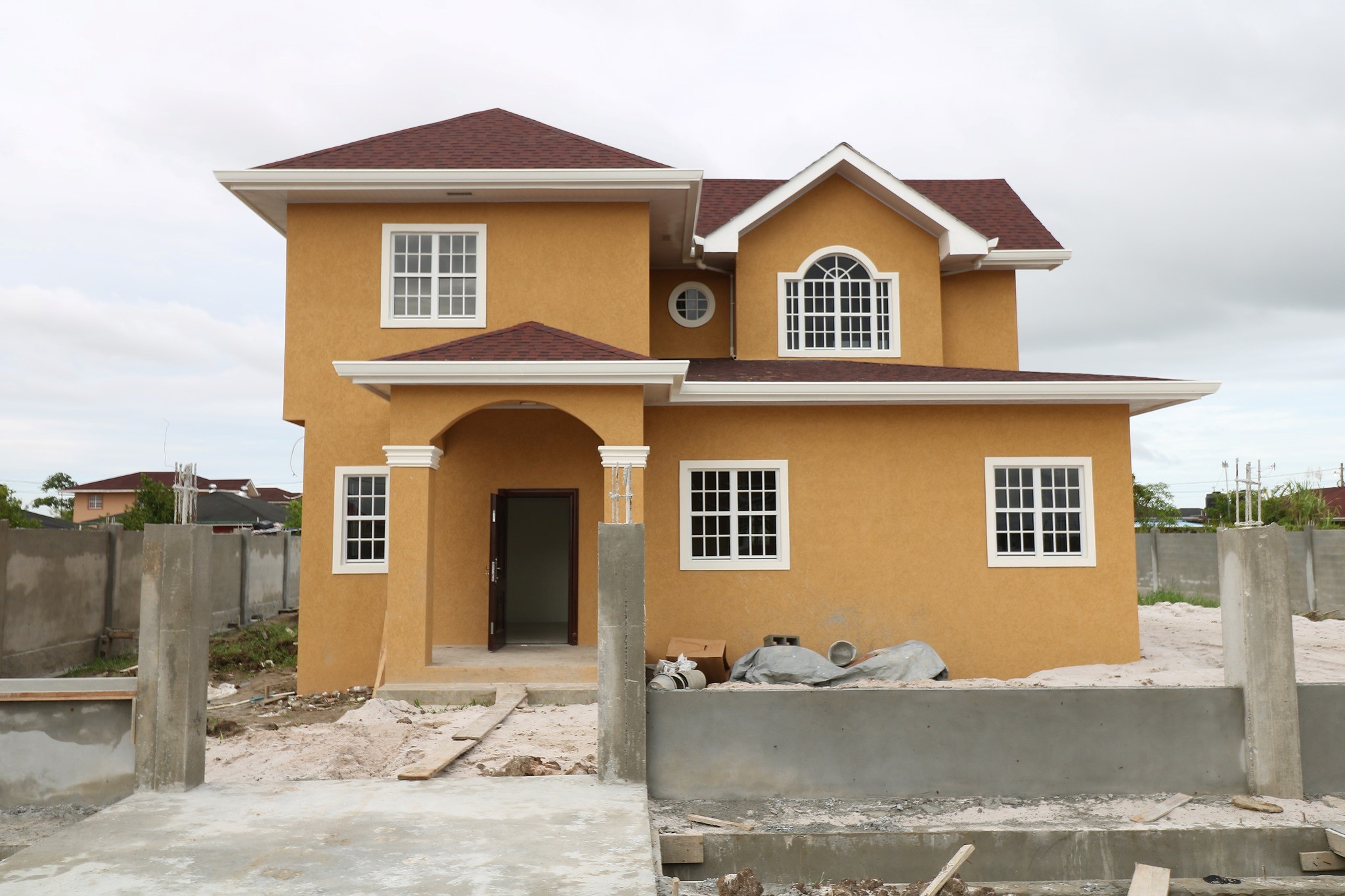 What is the price for government constructed houses in Guyana? Guyana