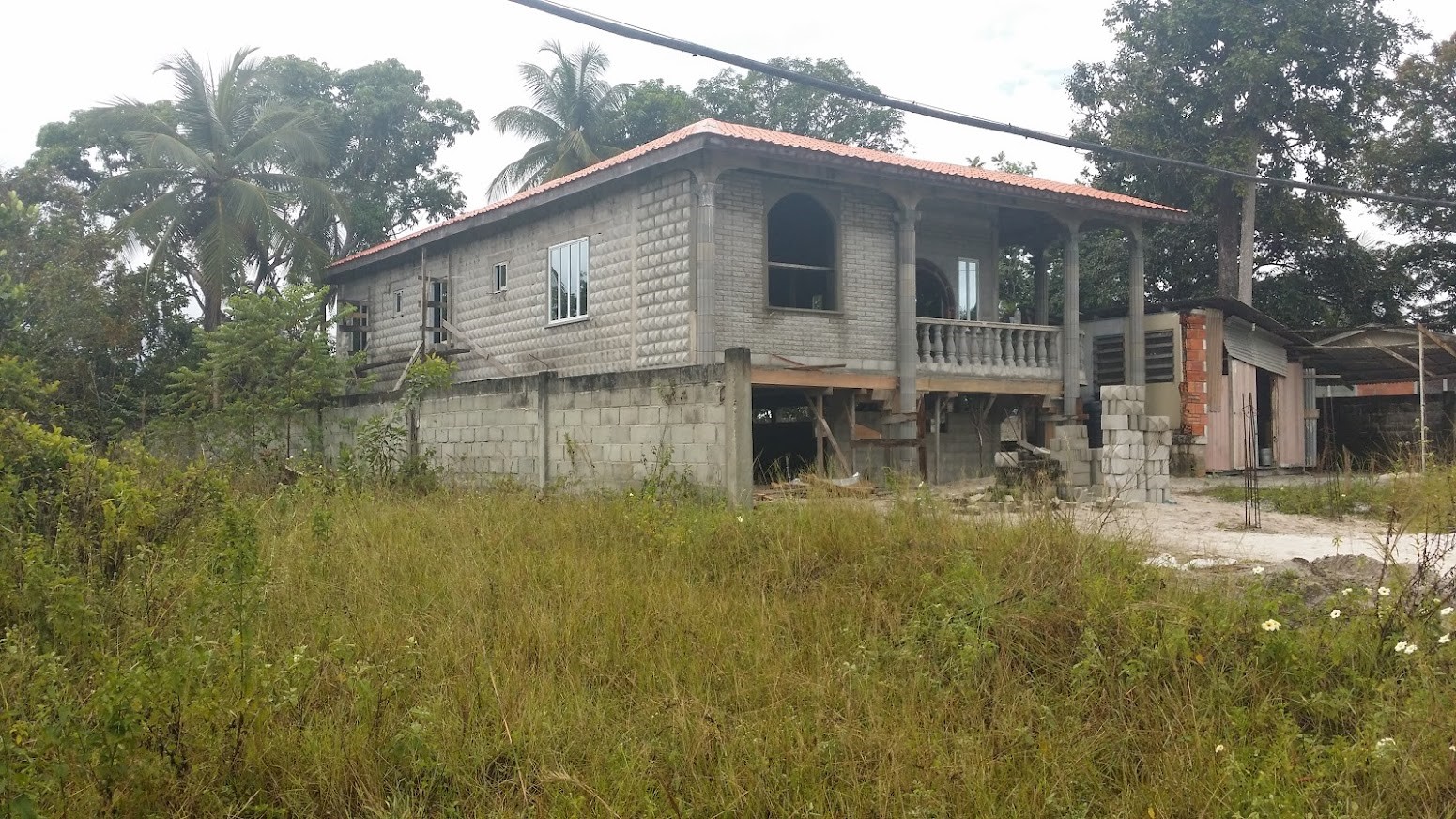 Large partially completed house Guyana Real Estate Services